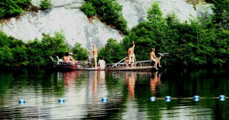 nudists enjoying the lake at  Solair Family Nudist Resort